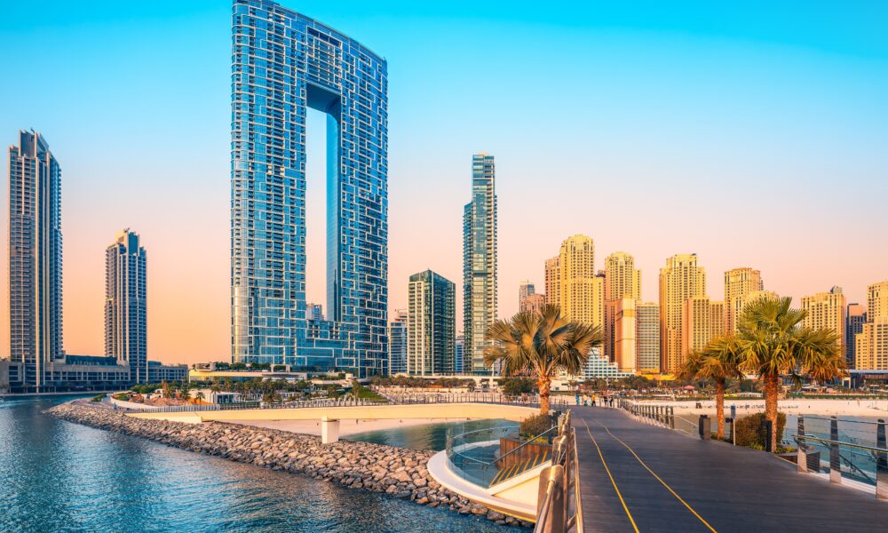 "Spectacular Dubai entertainment scene featuring illuminated city skyline with Burj Khalifa and Dubai Fountain at night"