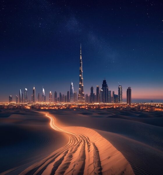 "Scenic view of Hatta Mountains with turquoise dam waters showcasing perfect day trip destinations from Dubai"