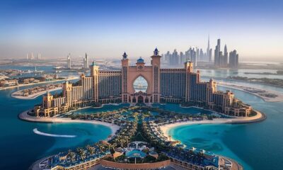 Beautiful mosque in Dubai illuminated during sunset with crescent moon for Ramadan celebrations