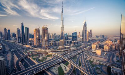 UAE construction law legal consultation with Dubai skyline showing modern buildings and cranes representing construction disputes