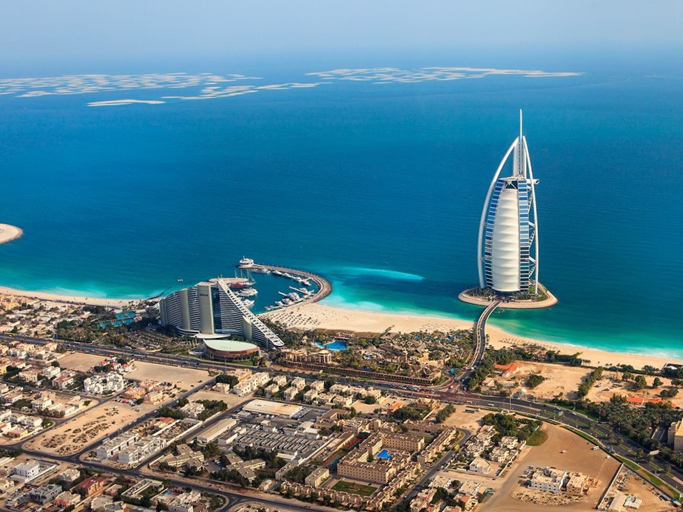 Corporate Tax UAE consultation with legal expert reviewing tax documents in Dubai office